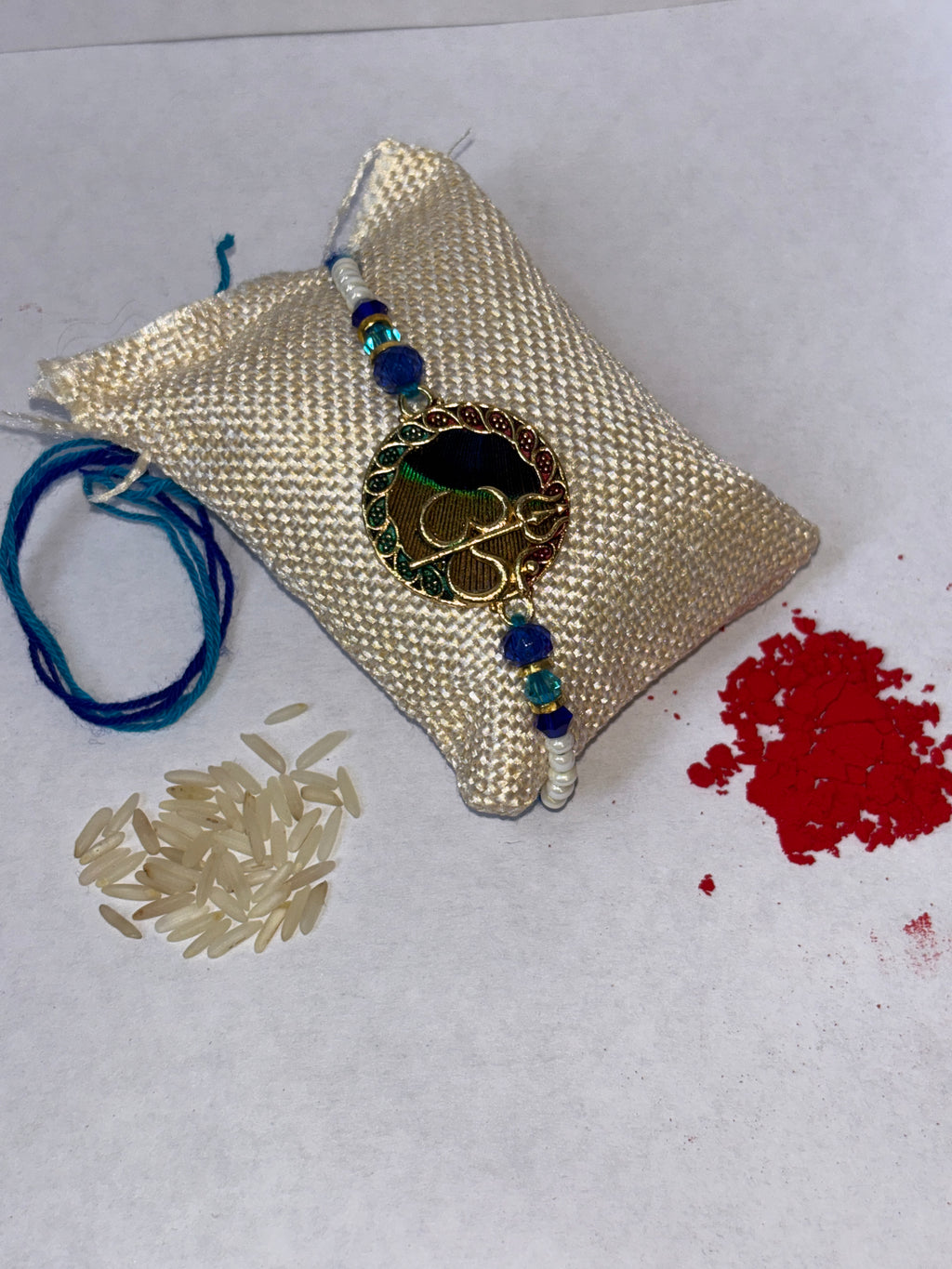 Sacred Om & Peacock Feather Brother Rakhi