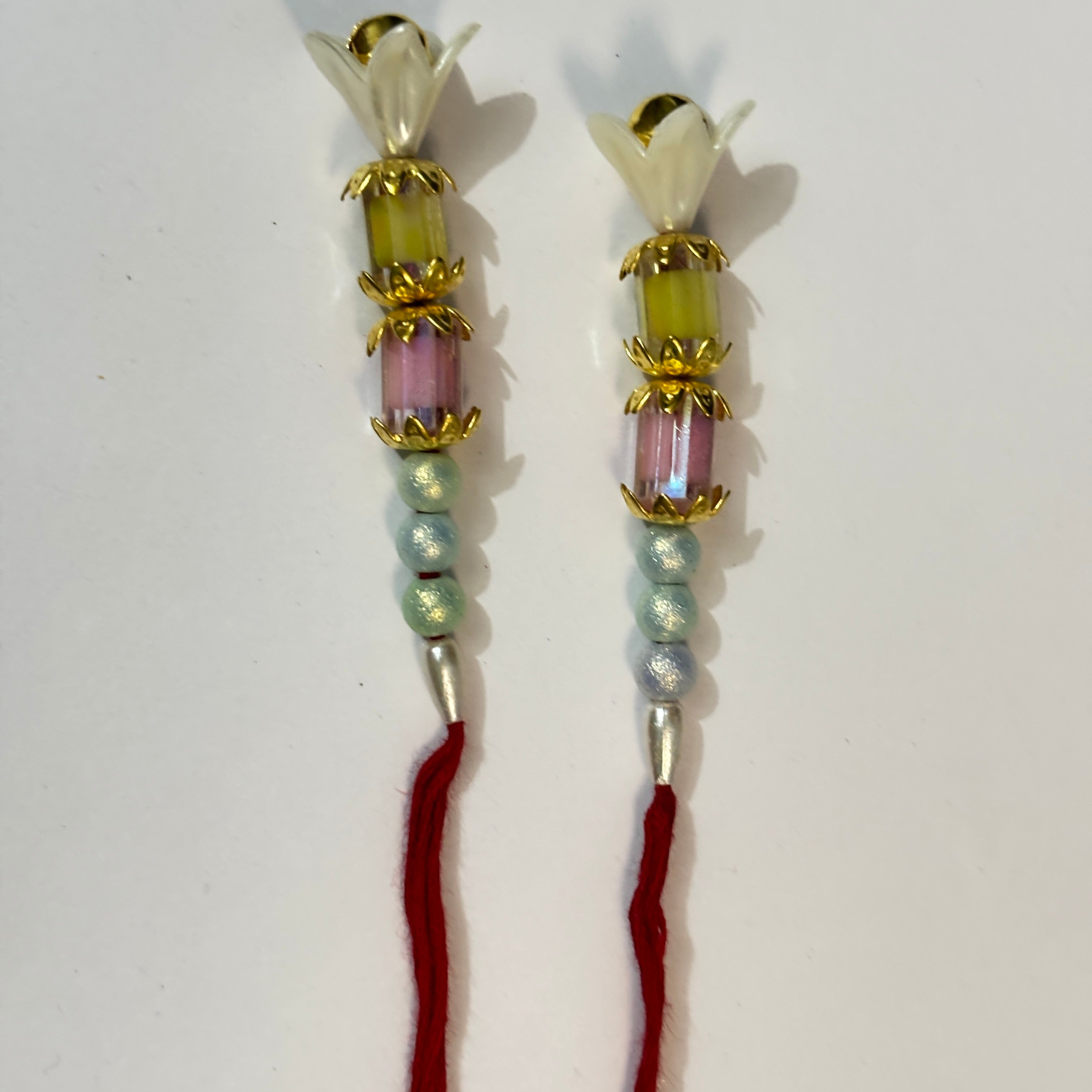 Traditional Pastel Floral Lumba Rakhi Set for Bhabhi (Pair of 2)